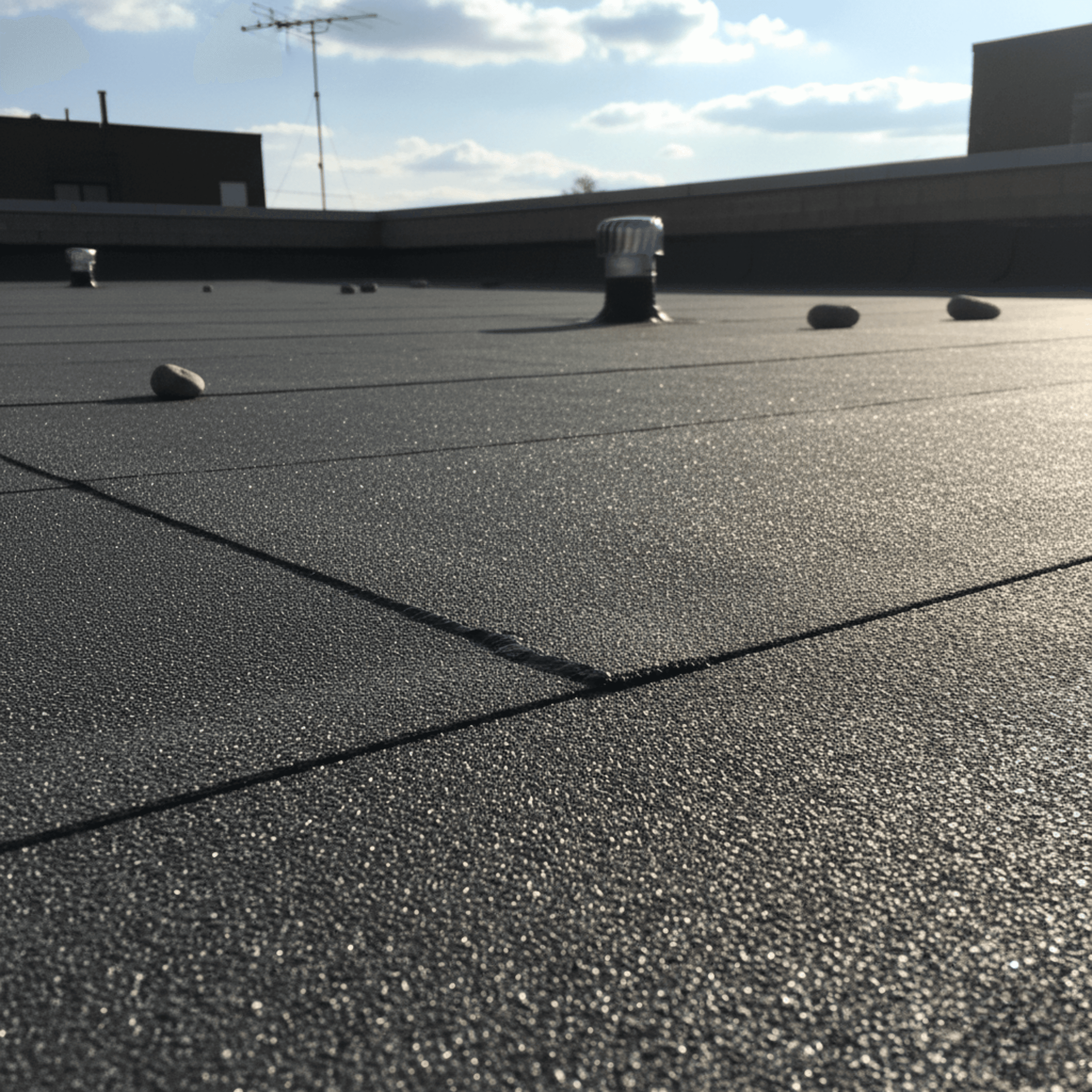 Modified bitumen roofing material with warranty temperature guidance