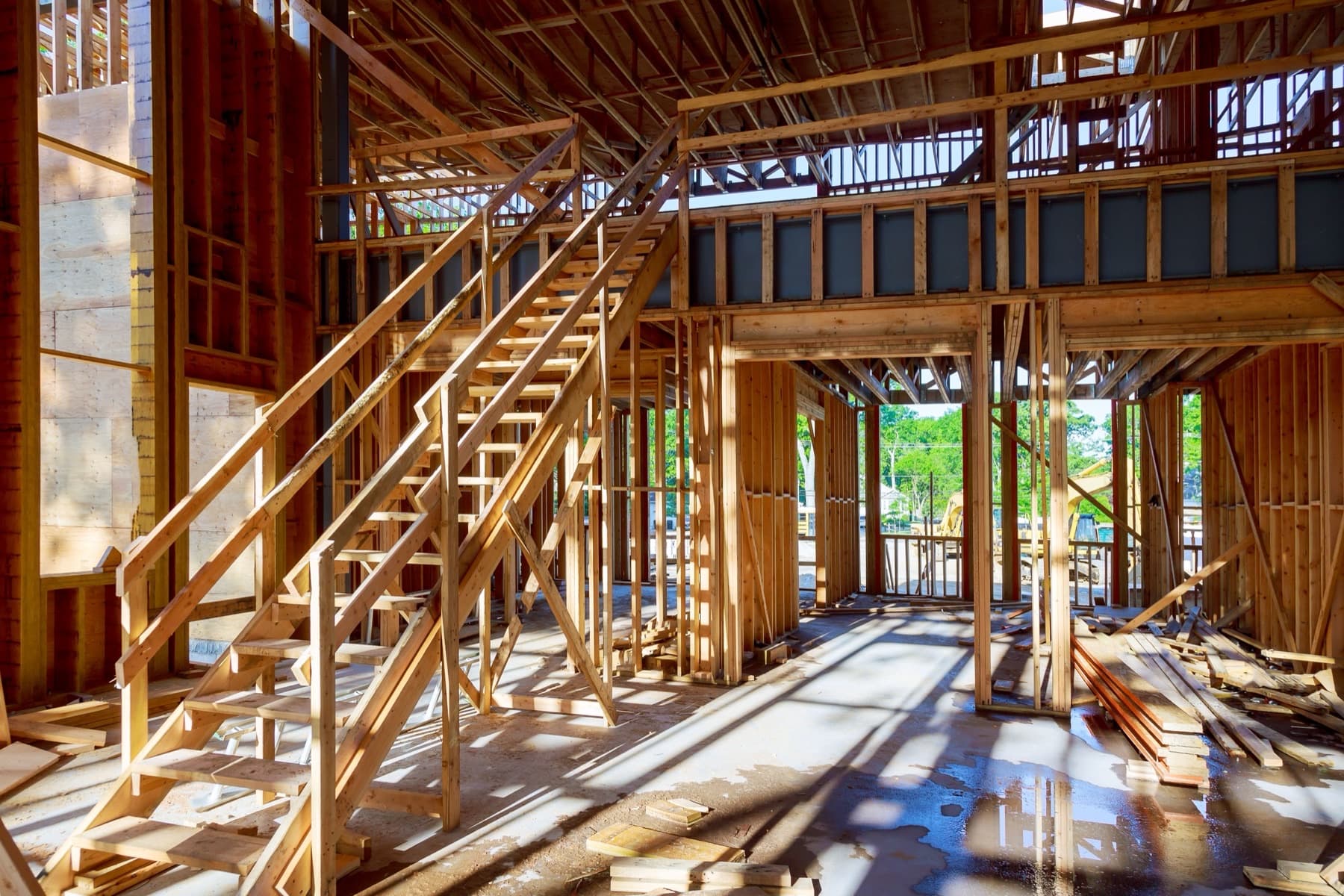 Wood-frame interior of a new house under construction.